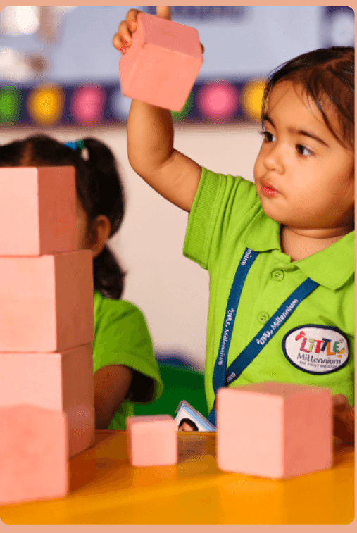 Little Millennium Sus — child building and learning with blocks in the classroom
